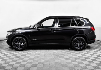 Подержанный автомобиль BMW X5 2014 года (8 фото)