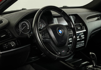 Подержанный автомобиль BMW X4 2015 года (11 фото)