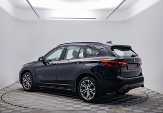 Подержанный автомобиль BMW X1 2017 года (7 фото)