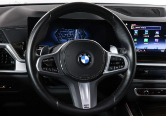 Подержанный автомобиль BMW X5 2023 года (15 фото)