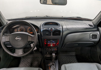 Подержанный автомобиль Nissan Almera Classic 2007 года (22 фото)