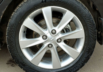 Подержанный автомобиль Hyundai Solaris Hatchback 2013 года (9 фото)