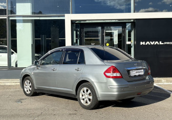 Подержанный автомобиль Nissan Tiida Sedan 2010 года (7 фото)