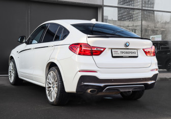 Подержанный автомобиль BMW X4 2015 года (6 фото)