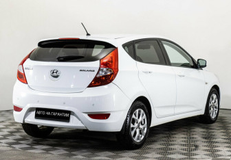 Подержанный автомобиль Hyundai Solaris Hatchback 2014 года (3 фото)