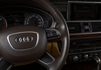 Подержанный автомобиль Audi A6 Sedan 2014 года (14 фото)