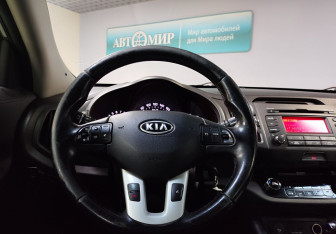 Подержанный автомобиль Kia Sportage 2012 года (15 фото)
