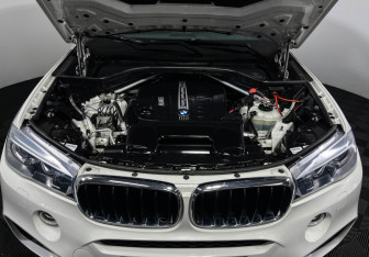 Подержанный автомобиль BMW X6 2018 года (10 фото)