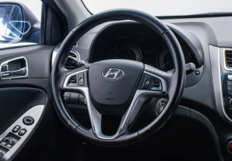 Подержанный автомобиль Hyundai Solaris Hatchback 2011 года (15 фото)