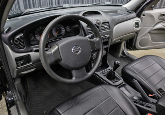 Подержанный автомобиль Nissan Almera Classic 2011 года (16 фото)