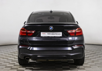 Подержанный автомобиль BMW X4 2015 года (6 фото)