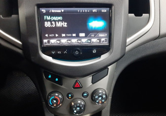 Подержанный автомобиль Chevrolet Aveo Hatchback 2013 года (14 фото)