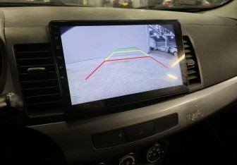 Подержанный автомобиль Mitsubishi Lancer Sedan 2011 года (13 фото)