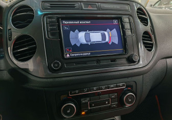 Подержанный автомобиль Volkswagen Tiguan 2013 года (15 фото)