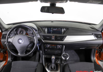 Подержанный автомобиль BMW X1 2014 года (12 фото)