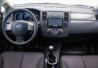 Подержанный автомобиль Nissan Tiida Sedan 2012 года (13 фото)