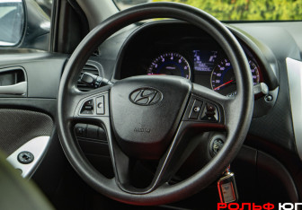 Подержанный автомобиль Hyundai Solaris Hatchback 2013 года (11 фото)