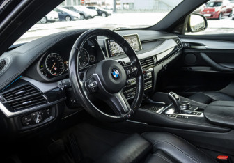 Подержанный автомобиль BMW X6 2018 года (11 фото)