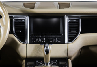 Подержанный автомобиль Porsche Macan 2015 года (14 фото)