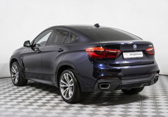 Подержанный автомобиль BMW X6 2015 года (7 фото)