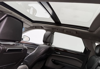 Подержанный автомобиль Cadillac SRX 2010 года (13 фото)