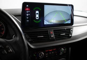 Подержанный автомобиль BMW X1 2014 года (15 фото)