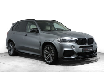 Подержанный автомобиль BMW X5 2014 года (3 фото)