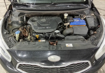 Подержанный автомобиль Kia Ceed Wagon 2013 года (15 фото)