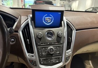 Подержанный автомобиль Cadillac SRX 2011 года (10 фото)