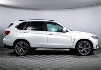 Подержанный автомобиль BMW X5 2014 года (4 фото)