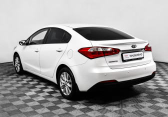 Подержанный автомобиль Kia Cerato Sedan 2013 года (7 фото)