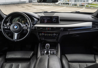 Подержанный автомобиль BMW X6 2017 года (11 фото)