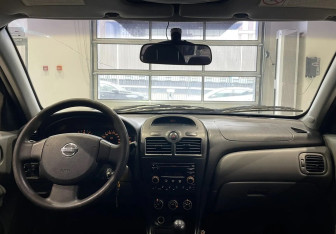 Подержанный автомобиль Nissan Almera Classic 2008 года (9 фото)