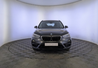 Подержанный автомобиль BMW X1 2017 года (2 фото)