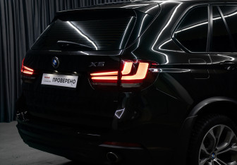 Подержанный автомобиль BMW X5 2014 года (24 фото)