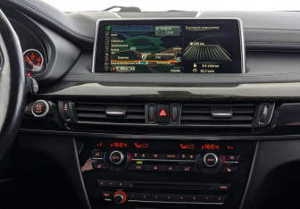 Подержанный автомобиль BMW X6 2016 года (15 фото)