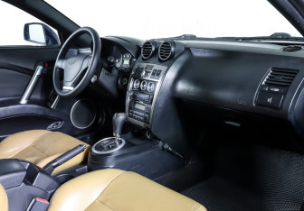 Подержанный автомобиль Hyundai Coupe 2002 года (11 фото)