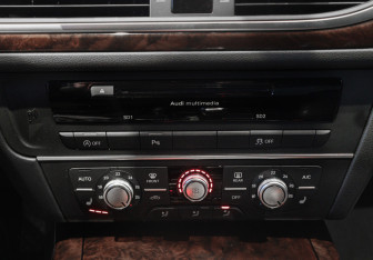 Подержанный автомобиль Audi A6 Sedan 2015 года (17 фото)