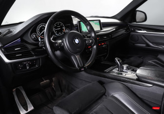 Подержанный автомобиль BMW X5 2015 года (14 фото)