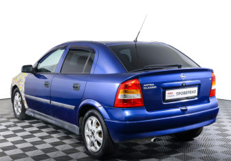 Подержанный автомобиль Opel Astra Hatchback 2004 года (7 фото)