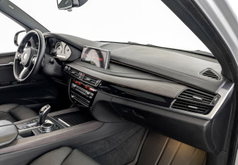 Подержанный автомобиль BMW X5 2014 года (11 фото)