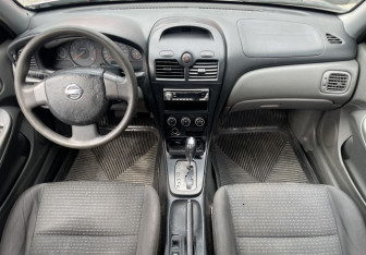 Подержанный автомобиль Nissan Almera Classic 2008 года (10 фото)