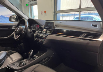 Подержанный автомобиль BMW X1 2018 года (13 фото)