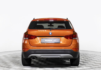 Подержанный автомобиль BMW X1 2014 года (6 фото)