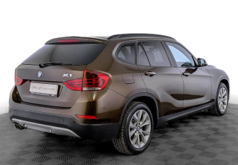 Подержанный автомобиль BMW X1 2012 года (5 фото)