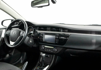 Подержанный автомобиль Toyota Corolla Sedan 2014 года (5 фото)