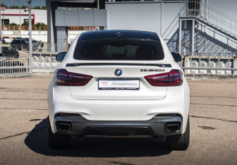 Подержанный автомобиль BMW X6 2016 года (6 фото)