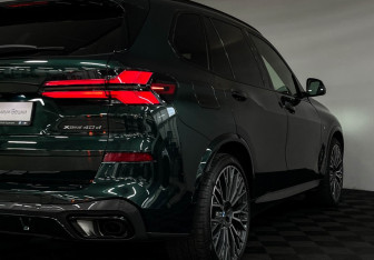 Подержанный автомобиль BMW X5 2024 года (36 фото)