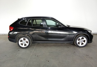 Подержанный автомобиль BMW X1 2013 года (7 фото)