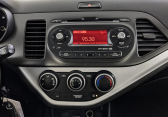 Подержанный автомобиль Kia Picanto 2013 года (15 фото)